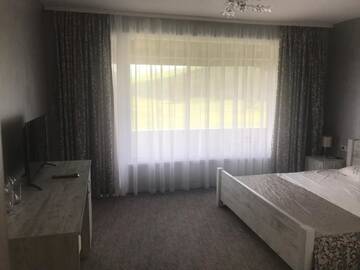 Фото номера Двухместный номер Делюкс с 1 кроватью и ванной Отель Комплекс Лебанов г. Yundola 5